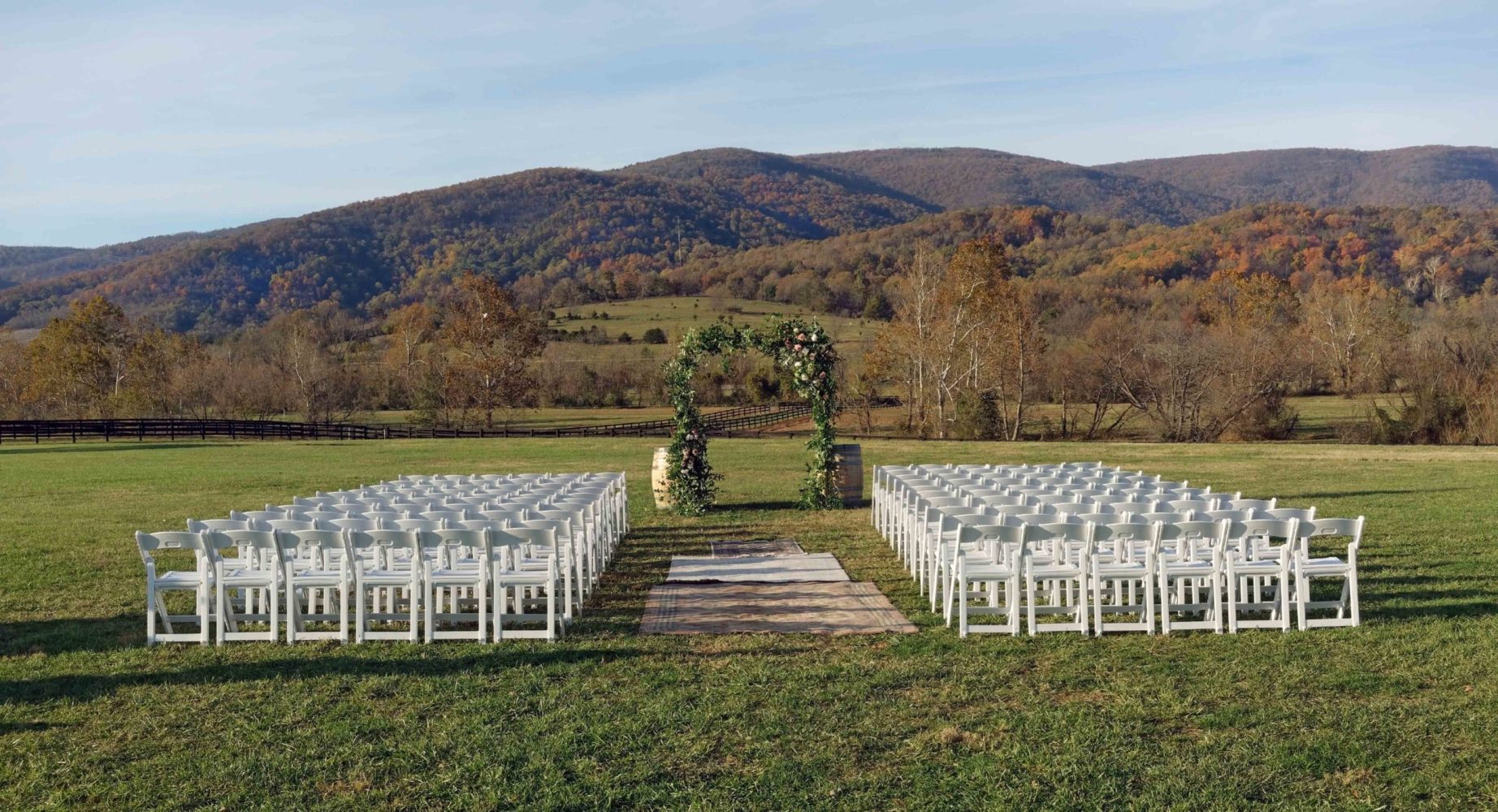 a bench with a mountain in the background