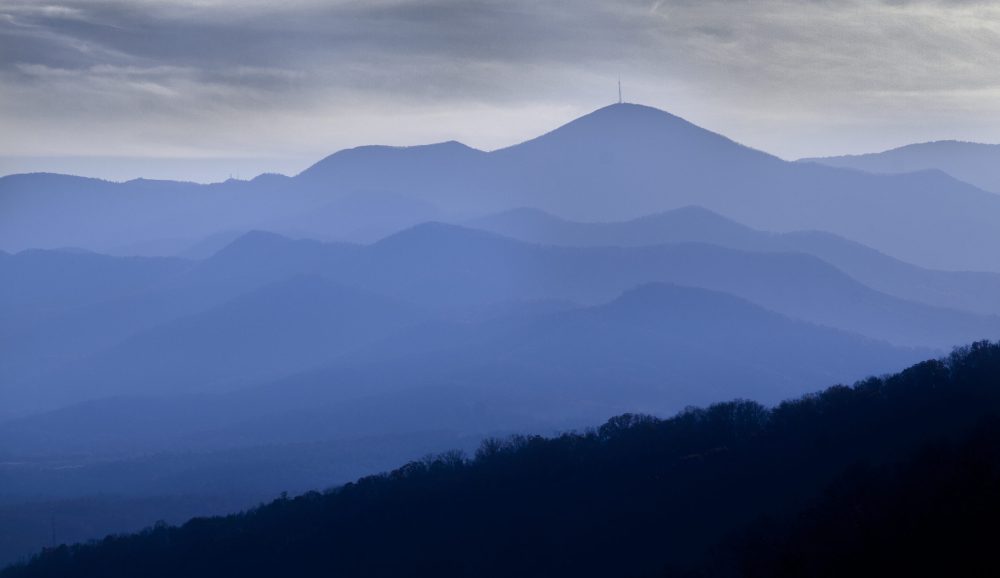 a view of a large mountain in the background