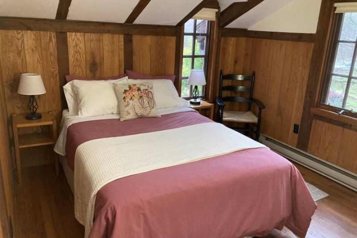 a bedroom with a large bed in a hotel room