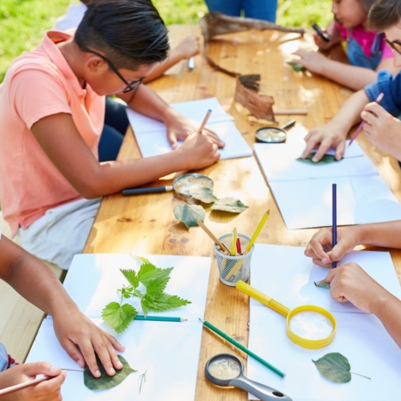 a group of people sitting at a table